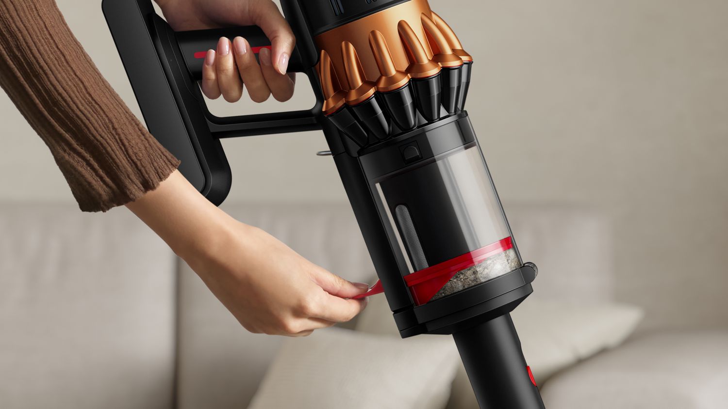 Dyson’s CleanCompaktor™ bin compressing dust and debris
